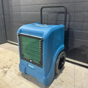 Portable blue Dri-Eaz air mover/dehumidifier on wheels with a handle