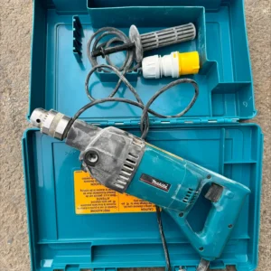 Makita electric drill with accessories in a blue carry case