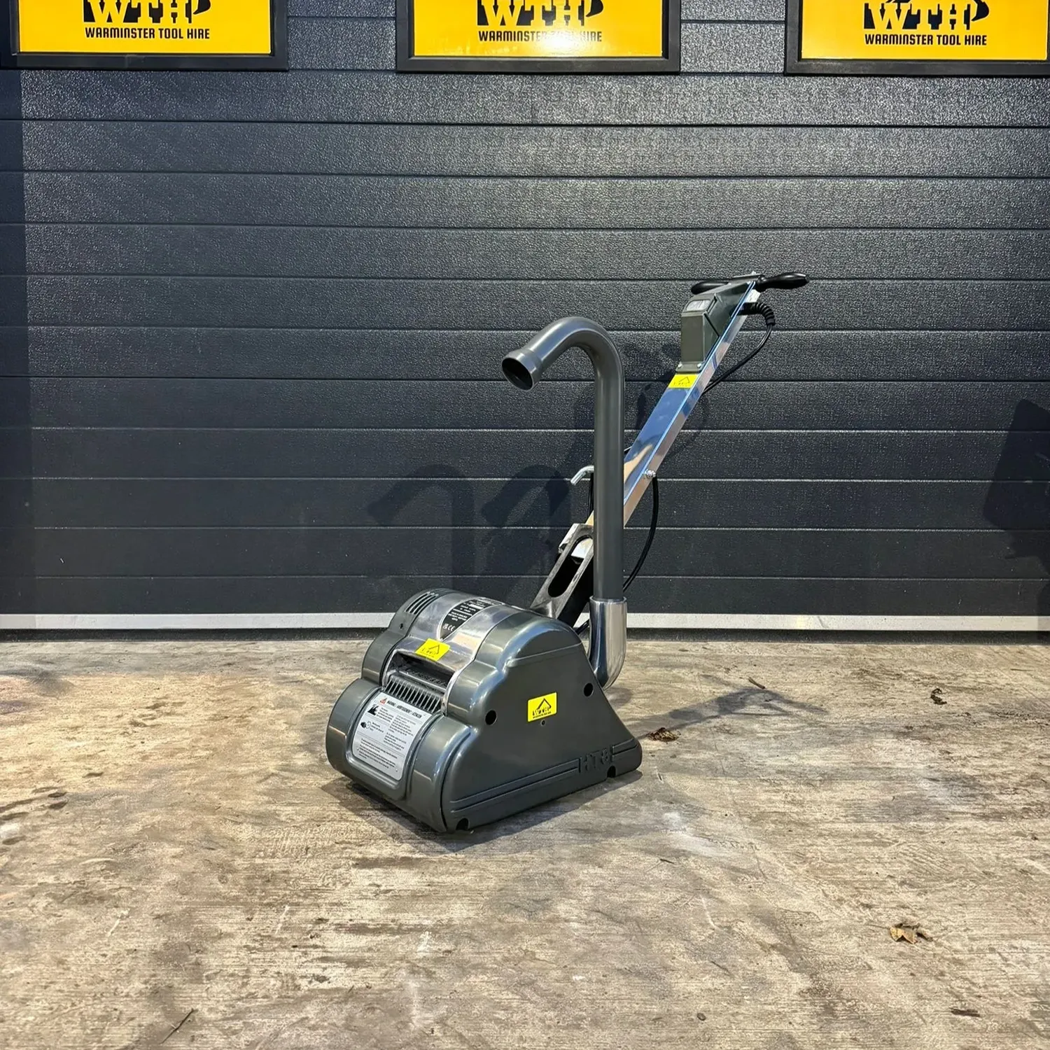 Floor sander on a workshop floor
