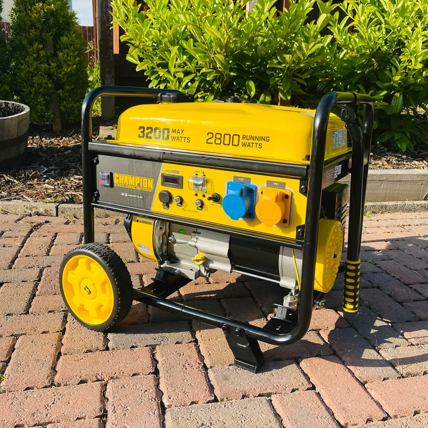 Portable yellow Champion generator on a paved patio outdoors