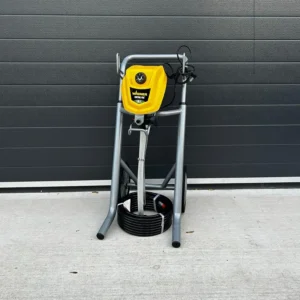 Wagner Control Pro paint sprayer on a wheeled stand with hose coiled at the base