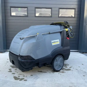 Kärcher pressure washer on wheels with hose and spray lance